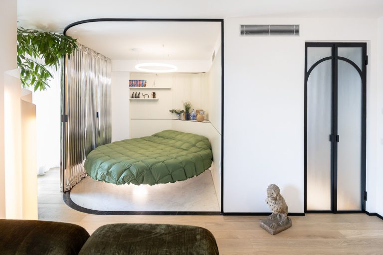 The Star of This 968-Square-Foot Milan Apartment Is a Disappearing Bed