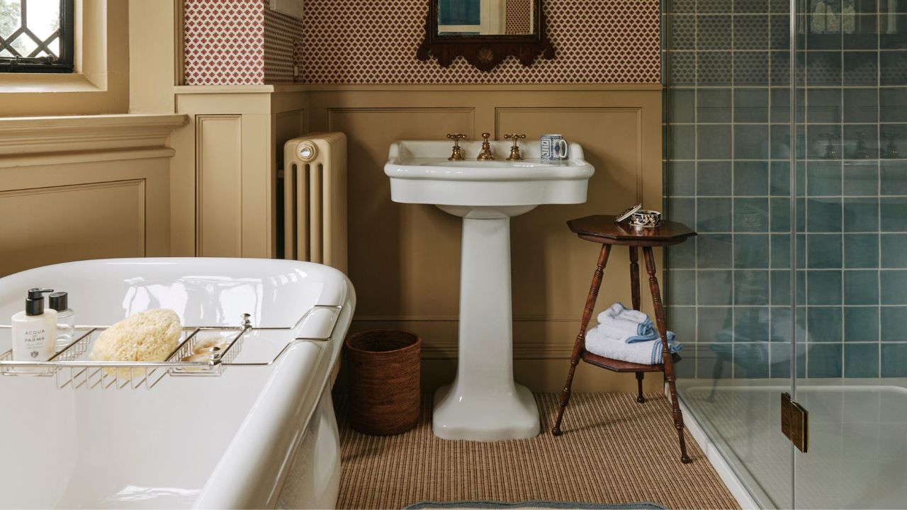 I can't believe I'm saying this, but is the carpeted bathroom making a return? Designers reveal whether this dated style can work in 2025