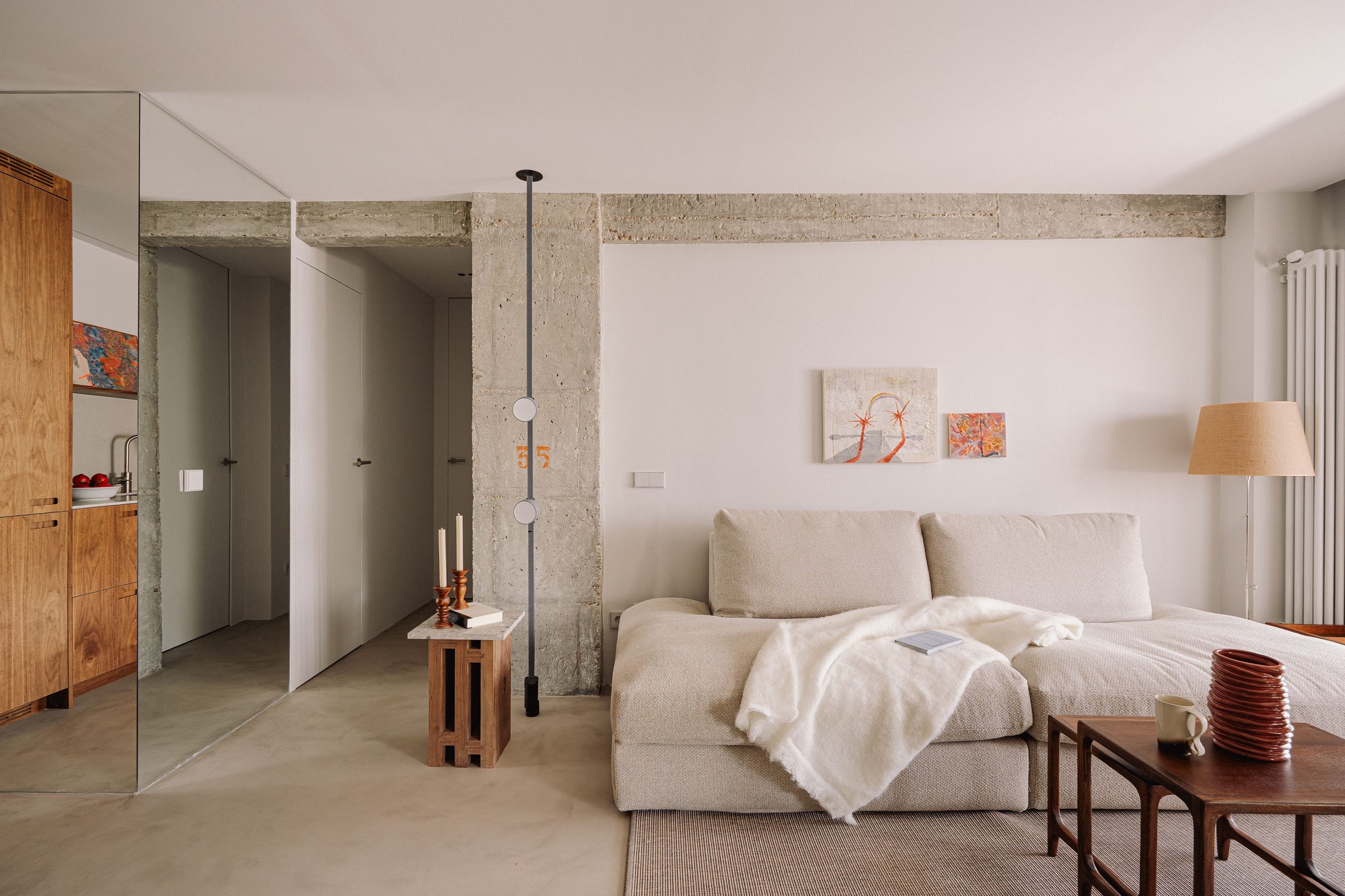 Within a Limited Budget, This Madrid Renovation Embraced Concrete Floors and Columns