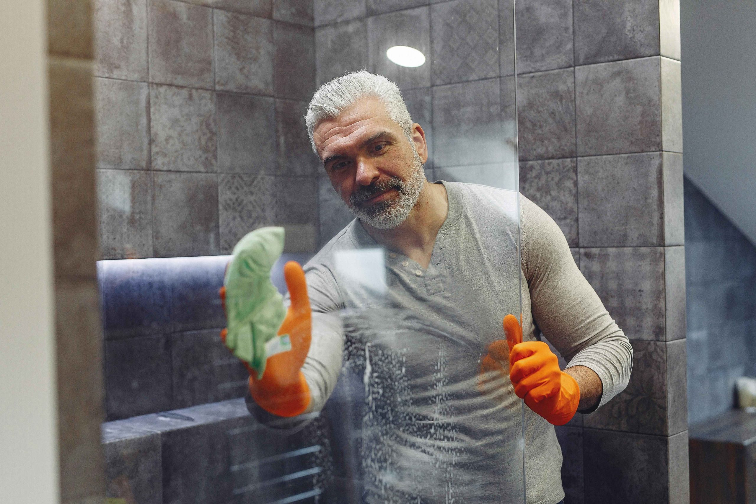 How to clean a glass shower door to keep grime at bay