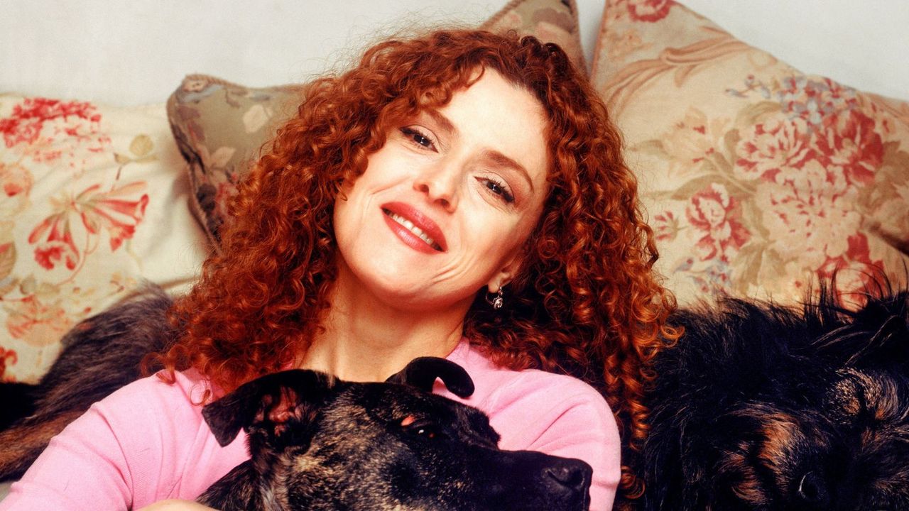 Bernadette Peters's '90s Living Room is a Masterclass in Styling a Red Sofa So it Doesn't Overwhelm a Space