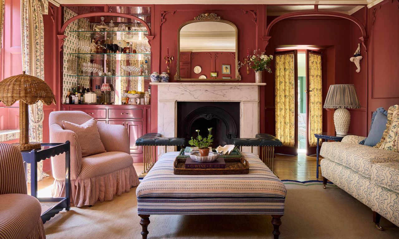 'Cocktail Hour Has Never Looked So Good' – How Uns Hobbs Used Rich Red Walls to Create a Living Room That Beckons You in for a Drink